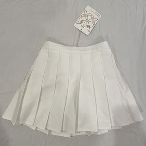 White mini skirt size 10-12/ school uniform skirt